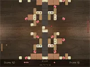 Arcaneoid free online game screenshot showing a ball bouncing between two paddles and breaking colorful blocks