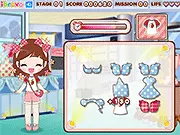 Screenshot of the Little Girl Shop Clothing game showing a cute girl standing next to racks of clothes, with an open shopping list on the side. Play the free online matching game.