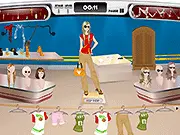 Screenshot of the Nadia Catwalk Show game featuring model Nadia posing in a glamorous outfit on a brightly lit fashion runway. Play the free dress-up game online.