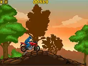 Forest Ride 2 free dirt bike game screenshot showing a biker riding over a large hill in a dark forest environment.