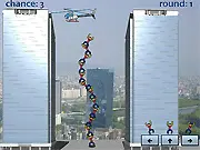 Helicopter Ladder free online physics game - creating a tall, unstable tower of people to reach a helicopter