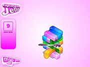 Free online skill game Japanese Jello, showing a spoon trying to balance multiple layers of brightly colored, wobbly jello blocks