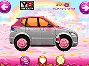 Screenshot of the Cute Car Wash game, showing a clean, pink princess car being decorated with accessories and tattoos, surrounded by fairy helpers on PlayArcadeHub.
