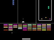 Four Score free online game screenshot showing the screen divided into four sections of different arcade games