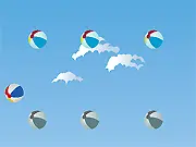 The BeachBall free online arcade game screenshot, yellow bucket catching a ball on a sandy beach