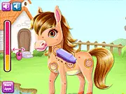 Baby Horse Caring free online game screenshot, giving a bath and makeover to a baby horse