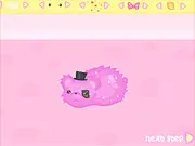 Screenshot of the My Dream Hamster Maker game showing a customized hamster cage with tunnels, house, and accessories