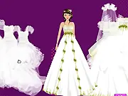 Screenshot from White Wedding Gowns showing a model trying on a beautiful, intricate white wedding dress, available to play free online.