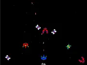 Screenshot of Wings of Madness 2 shoot 'em up game showing a spaceship firing on alien enemies in a retro arcade style
