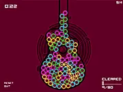PhysBallz physics puzzle game screenshot, colored balls rolling and being linked together