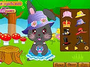 Screenshot of Cute Bunny Dress Up game showing a blinking cartoon bunny wearing a funny hat and small clothes, free online animal styling game.