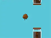 Play Flappy Beans free online skill game, showing a bouncing bean character flying between green pipes.