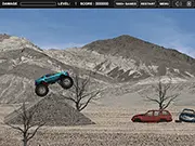 Big Wheels Trial free online monster truck game, large red truck driving over a stack of crushed cars on a bumpy trial track
