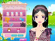 Nails and Hair Salon free online makeover game showing a girl with styled hair and painted nails