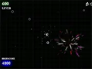 Flash Geometry Wars free online game screenshot showing a small white spaceship shooting a stream of bullets at multiple brightly colored geometric enemy shapes in a dark arena