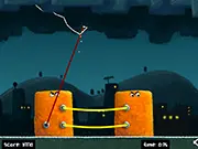 The Wezap online game showing Bob's fiery rocket approaching a set of colored obstacles that must be zapped away