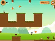 Gameplay screenshot of Box Master showing a man pushing a brown box near dangerous spiked traps on a platform