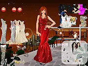Screenshot of A Magic Night Dressup showing a beautiful female character modeling a long, flowing blue and purple gown with delicate jewelry, ready for a fantasy ball. Play free online dress-up game.