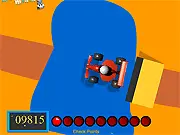 Gameplay screenshot of Makai Grand Prix 2 showing a colorful race car drifting around a corner while avoiding a large oil slick hazard on the track.