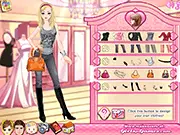 Screenshot of Makeover Designer 2 free online game showing an entire family dressed in colorful, cute outfits after receiving a makeover