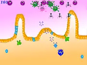 Screenshot of Immunity Defender free online game showing a stylized immune cell shooting laser beams at invading green bacteria and red virus shapes