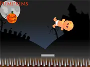 Screenshot of the Baby Bouncer game, showing an infant bouncing on a colorful pad aiming for a pumpkin target.