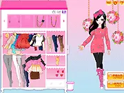 Rose Mania Fashion Makeover free online game screenshot, showing a girl styled in a pink dress with rose-themed accessories