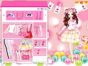 Play Pink Valentine free dress-up game online. A girl is shown wearing a stylish pink outfit with hearts and accessories for Valentine's Day.