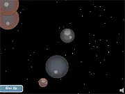 Cosmic Crush 2 game screenshot, small planet avoiding large planet, physics-based free online game