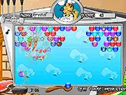 Screenshot of Food Bubble Shooter game showing a cannon aiming at clusters of food-themed bubbles in a classic puzzle setup, play free online