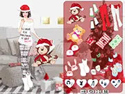 Play Christmas Pajama Party free online dress-up game. A girl is shown wearing a cute, comfortable Christmas-themed pajama outfit with festive accessories.
