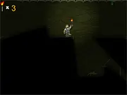 Torches game screenshot showing a character with a torch in a dark, underground catacomb on PlayArcadeHub