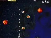 Screenshot of the classic arcade shooter game Truxton, showing the player's Missile Cannon ship firing on alien enemies and asteroids in deep space