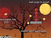 Demon Destroyer free online game screenshot showing a launched yellow smiley face projectile hitting a stack of purple demon blocks