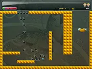 Screenshot of Baby Ball online physics puzzle game showing a ball rolling down a ramp made of blocks toward a baby's basket