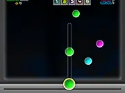 The Obble game screen showing a cannon at the bottom aiming a colored orb toward a cluster of other stationary, multi-colored orbs on the screen