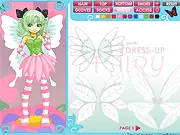 The Dress Up Fairy free online game screenshot, showing a beautiful fantasy sprite in a garden setting with flowing gown and large wings.