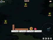 Hungry Orange Puzzle online game screenshot showing an orange character and scattered fruits with a bomb placed nearby ready for detonation