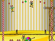 Clowns High free online skill game gameplay screenshot, a seesaw bouncing colorful falling clowns into the air.
