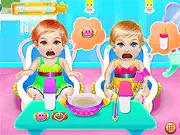Twin Baby Day Care free online game screenshot, dressing up and caring for twin babies