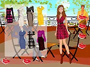 Nicki at the Cafe dress up game, a girl sitting at a cafe table, choosing a casual dress online