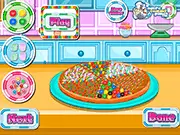 Decorating a delicious candy pizza with colorful gummies and frosting in the free online game Cooking Candy Pizza.