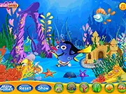 Dory's Fish Tank free online decoration game showing a colorful aquarium filled with decorative items and small fishes.
