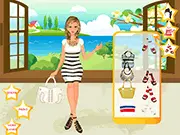 Gloria Stripes Dressup free online game screenshot showing a girl wearing a fashionable striped dress and stylish accessories