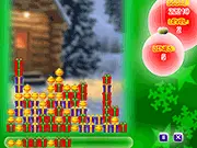 Free online gameplay screenshot of Xmas Gift Puzzle, showing colorful Christmas presents stacking up in a match-3 game