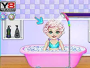 The Tooth Fairy, Mrs. Twinkle, in a beautiful sparkling dress and wings, preparing magic dust in Tooth Fairy Baby Care online game