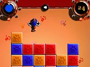 Screenshot of Cannon Crush online game showing a cannon aiming at a stack of colorful wooden cubes in a level backdrop.