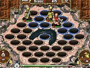 Screenshot of Whack-a-Gob game with a dwarf wielding a hammer, ready to hit green goblins popping out of holes, play free online
