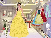 Play Graceful Gowns free online wedding dress-up game on PlayArcadeHub | Screenshot of a beautiful bride model in an elegant white wedding dress.