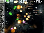 Gameplay screenshot of Endless Space Defense online game showing a base under attack with missiles and player-controlled turrets firing lasers